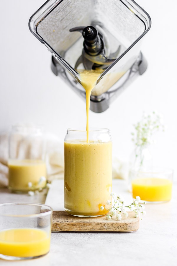 Immune Boosting Orange Smoothie - packed with healthy nutrients to help you keep feeling your best! (Dairy-Free) #immunitysmoothie #immunityboostingsmoothie #healthyorangesmoothie #orangesmoothie #vitamincsmoothie #dairyfreesmoothie #almondmilksmoothie 