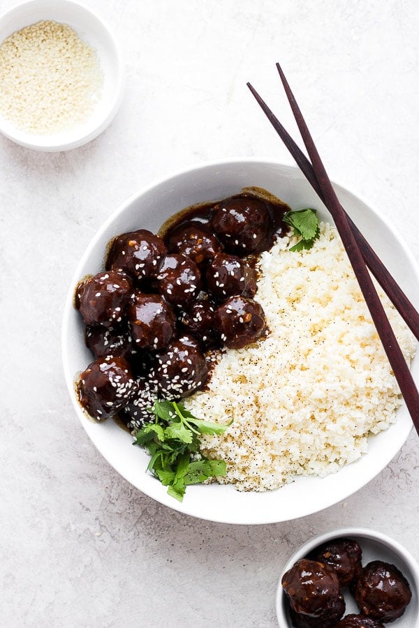 Bowl of teriyaki meatballs with cauliflower rice.