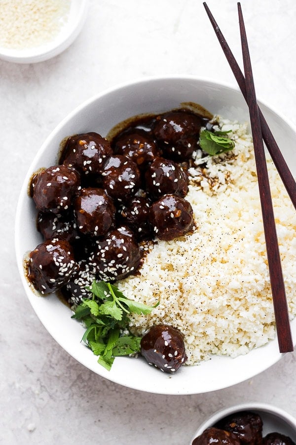 Bowl of teriyaki meatballs with cauliflower rice.