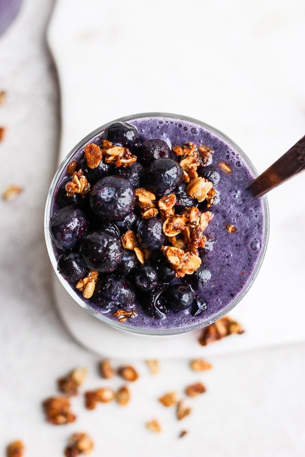 A top shot of a blueberry banana smoothie.