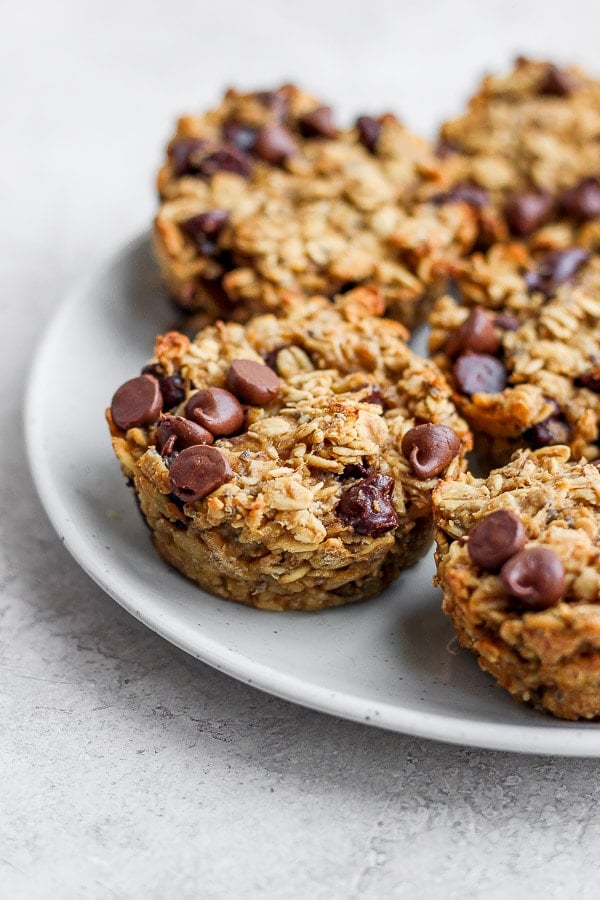 Side view of baked oatmeal cup on a plate. 