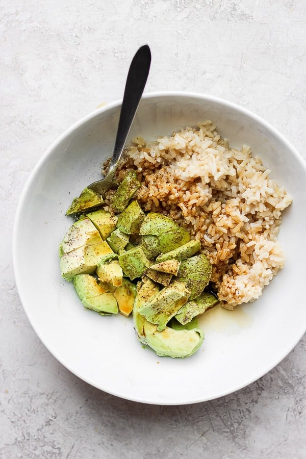 Avocado + Brown Rice Bowl - My favorite, simple go-to lunch/dinner that is amazing on its own, but feel free to add in some protein too! So many options!  Kid-friendly and perfect for a quick and easy weeknight dinner! (Dairy-free + GF) #brownricebowls #plantbasedrecipes #avocadorecipeshealthy #avocadorecipes #avocadobrownricebowls