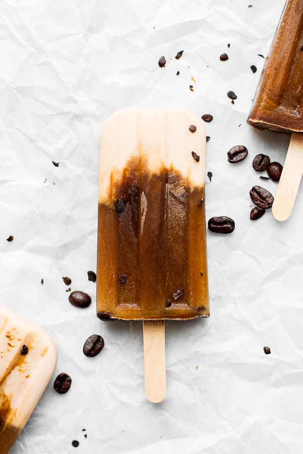 Coffee Popsicles on a piece of crumbled parchment paper.