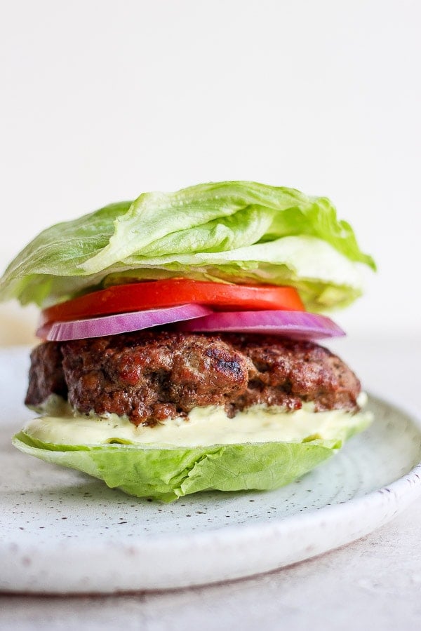 A burger on a lettuce bun. 