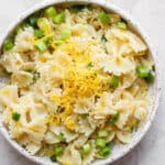 Bowl of lemon pasta with lemon zest on top.