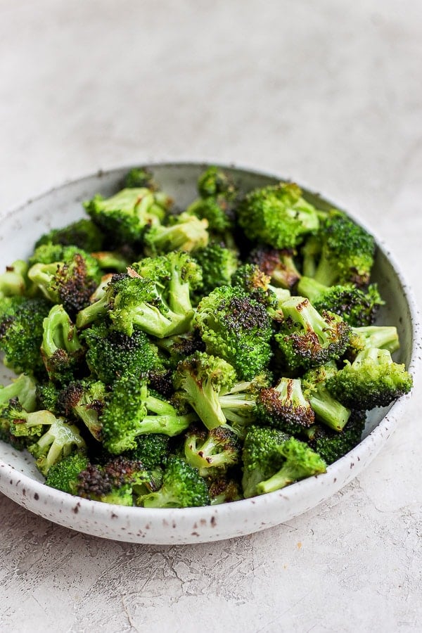 Grilled broccoli in a bowl.