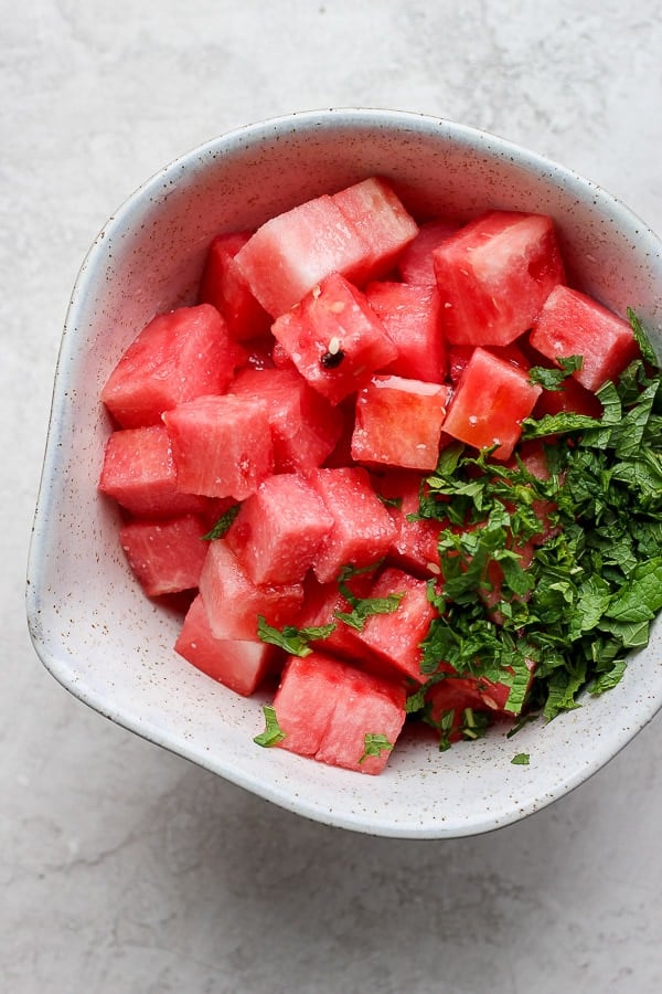 A large mixing bowl with all of ingredients before mixing.