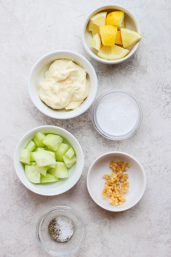 Ingredients for Tzatziki Sauce in little bowls. 