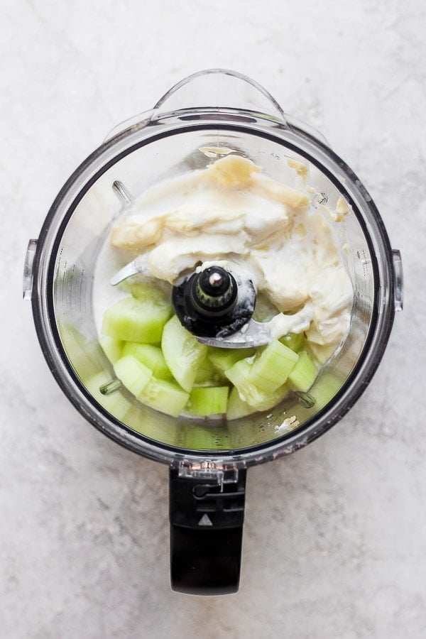 Ingredients for dairy free Tzatziki Sauce in a food processor before processing.