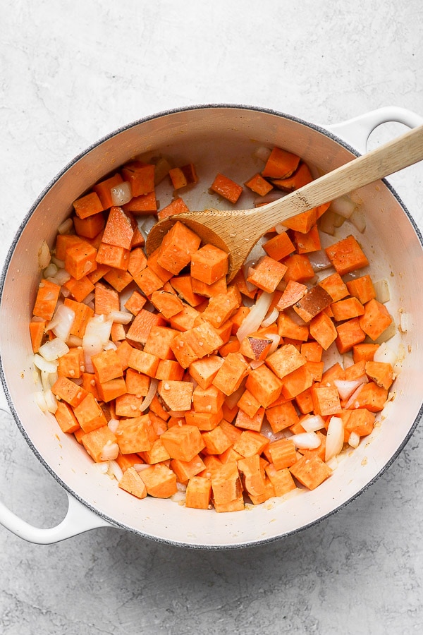 Diced sweet potatoes in Dutch oven. 