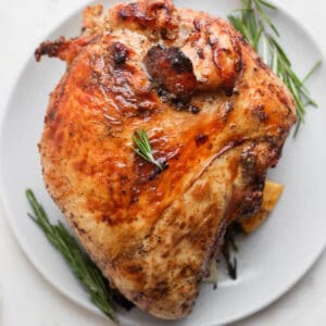 A grilled turkey breast on a plate.