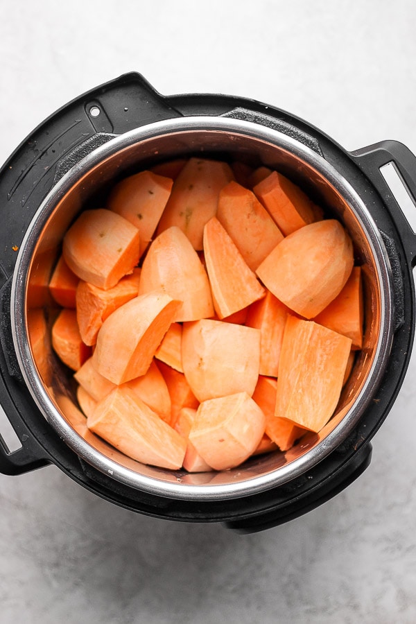 Peeled and cut-up sweet potatoes in an InstantPot.
