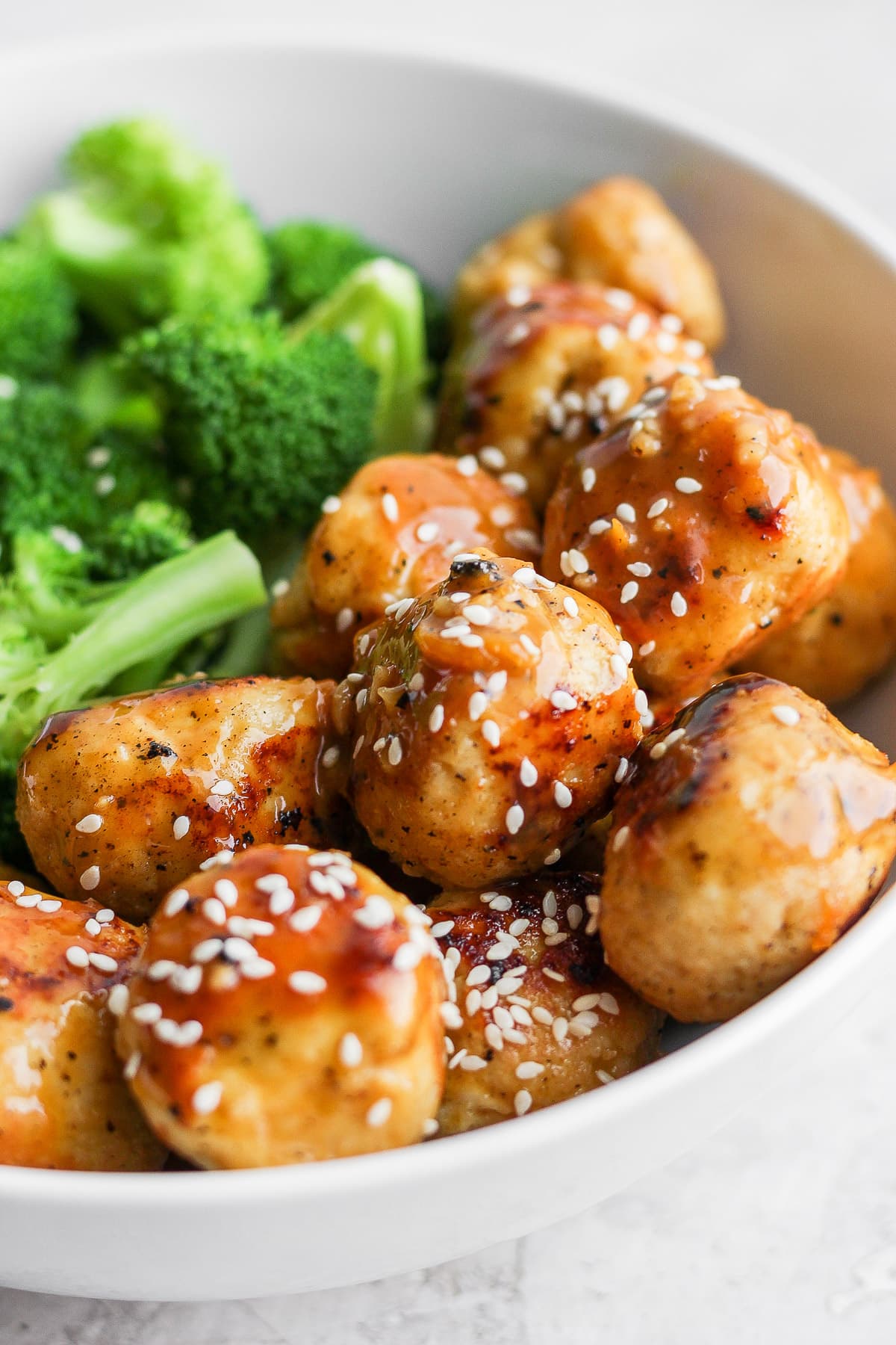 Bowl of orange chicken meatballs. 