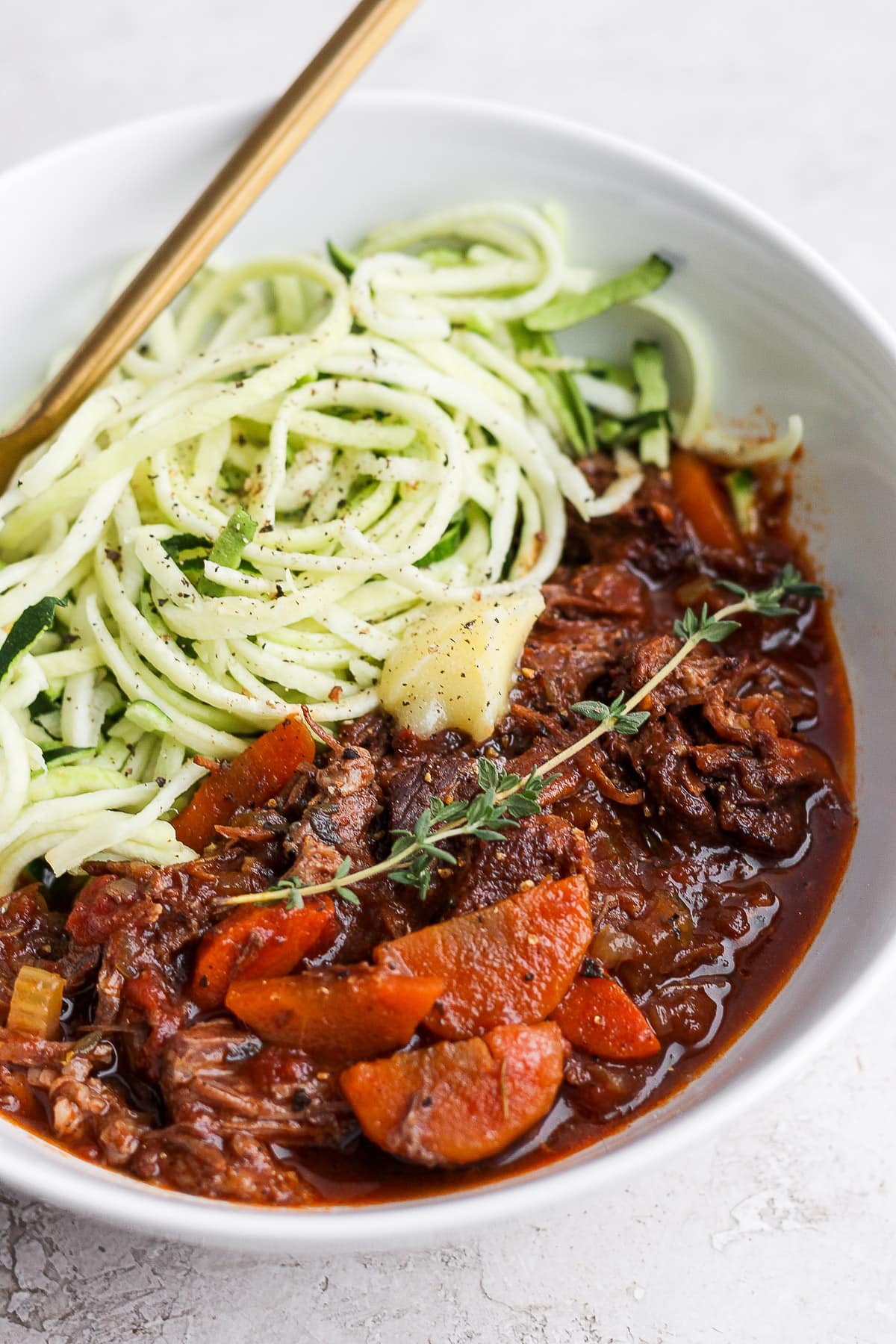 Bowl of beef ragu with zucchini noodles. 
