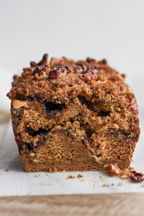 Gluten free coffee cake after it has been cut into to see the inside.