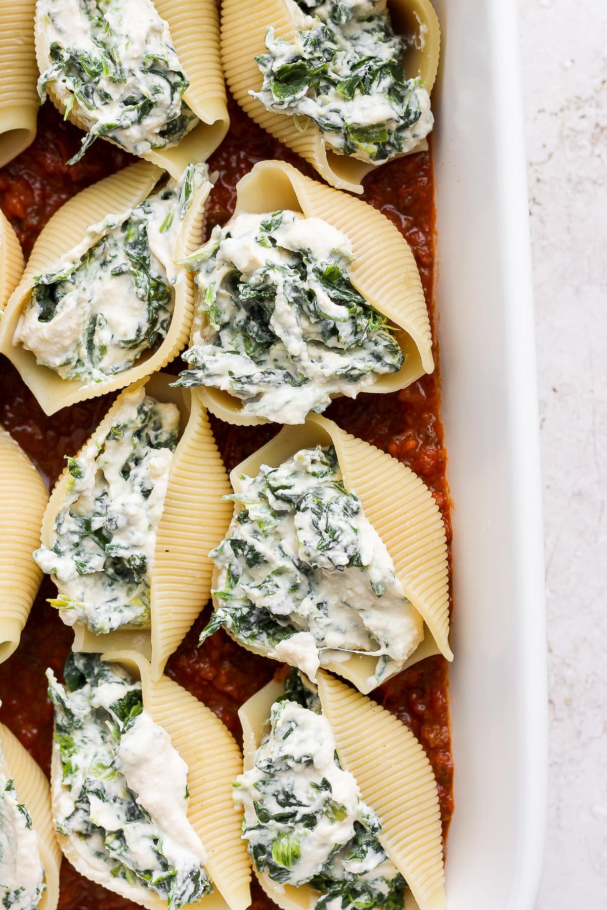 An easy vegan stuffed shells recipe with spinach.