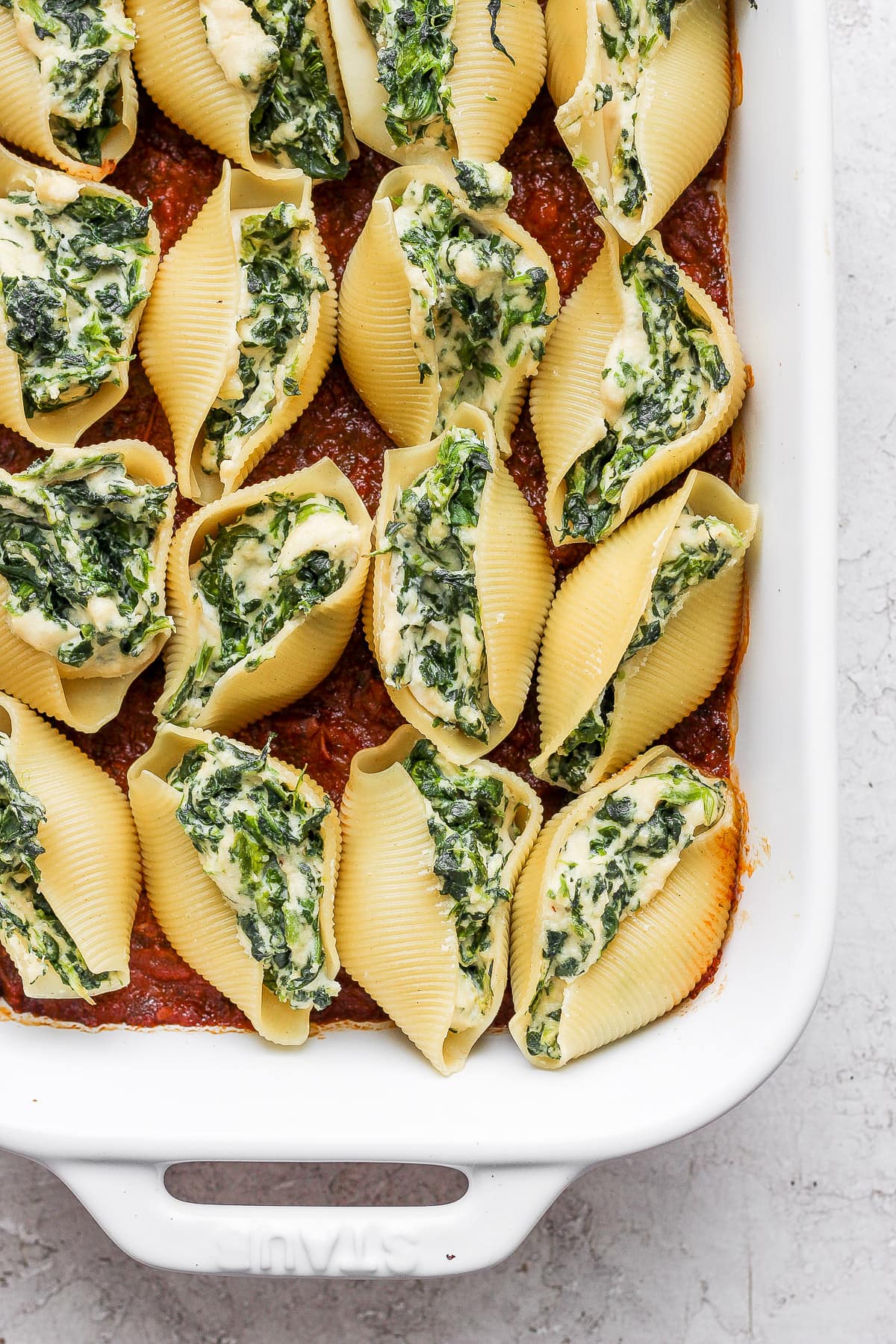 Baked stuffed shells after baking in the oven.