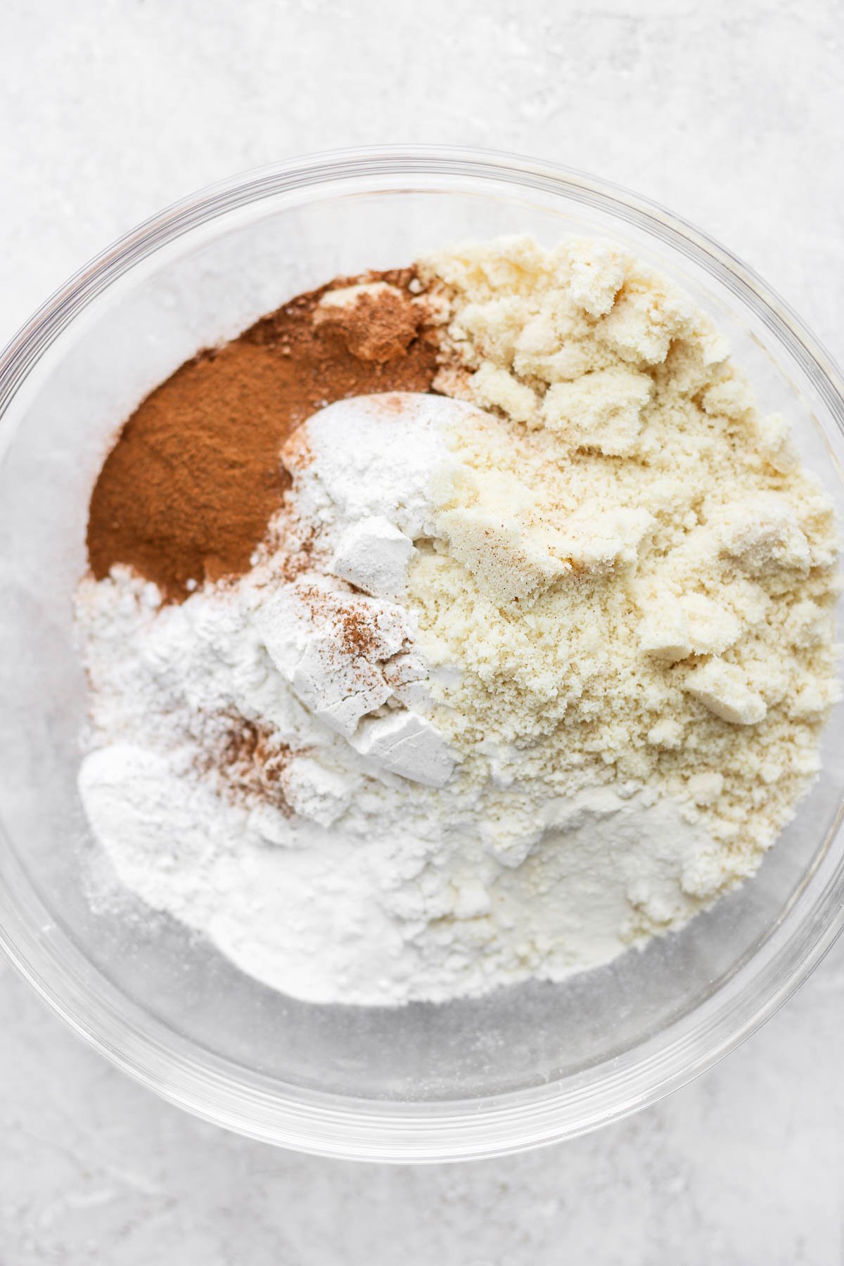 Bowl of dry ingredients for gluten free carrot cake.