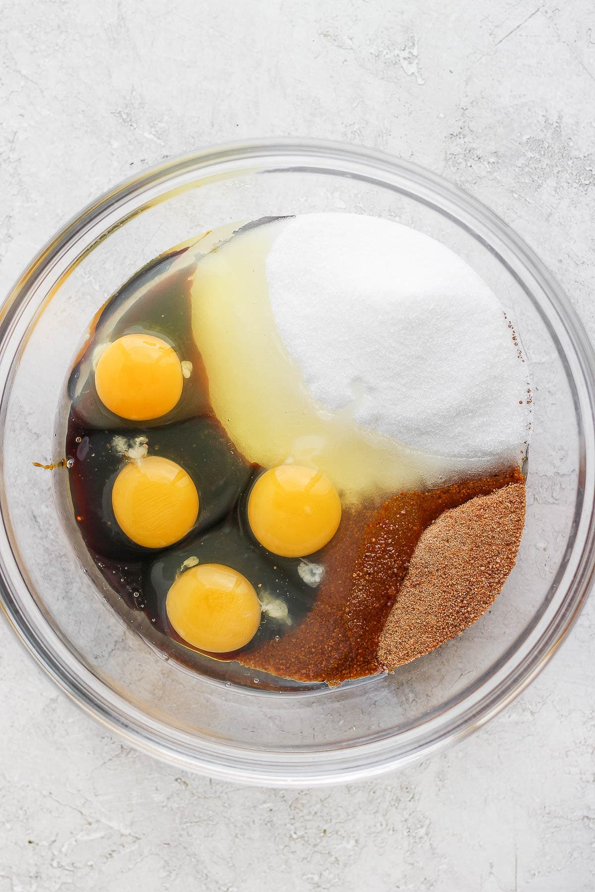 Wet ingredients for gluten free carrot cake in a bowl.