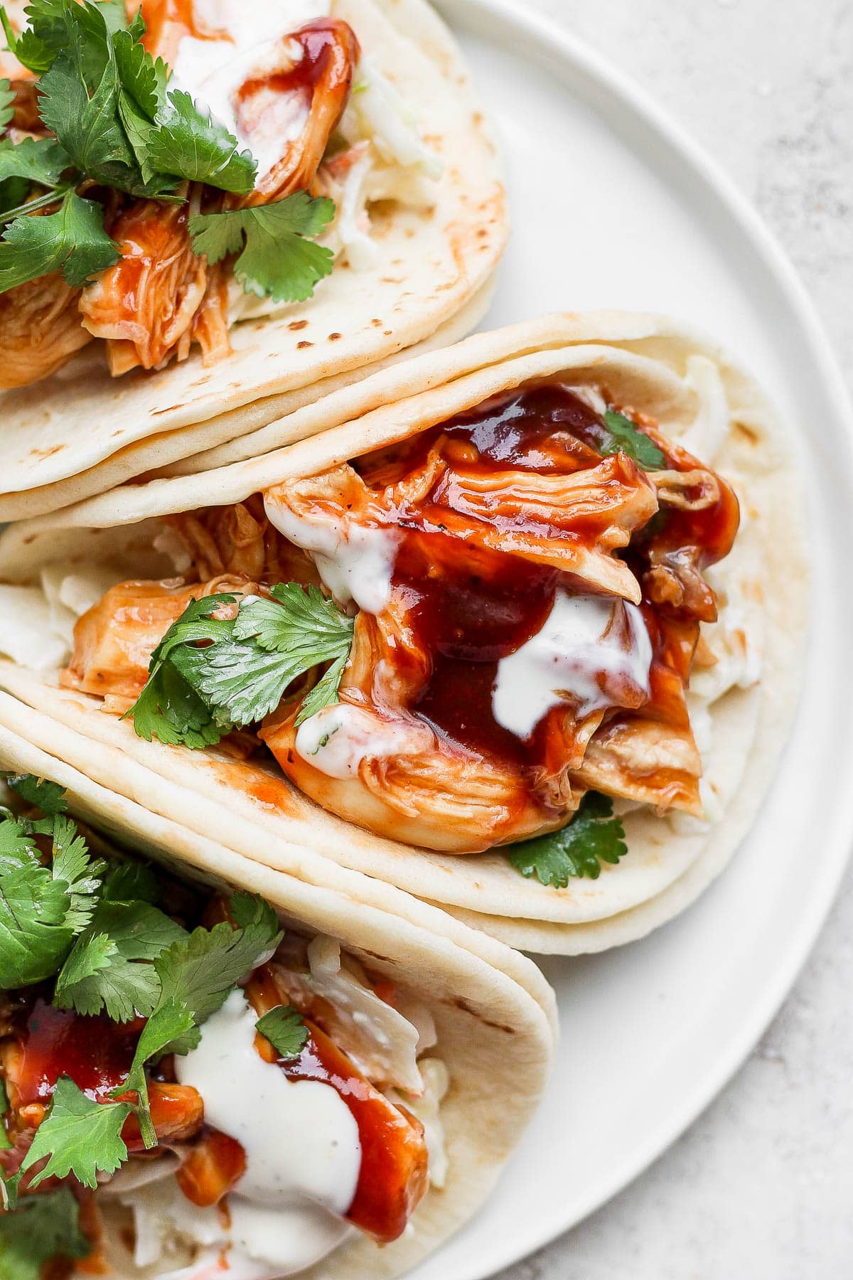 Instant pot bbq chicken as tacos on a plate.