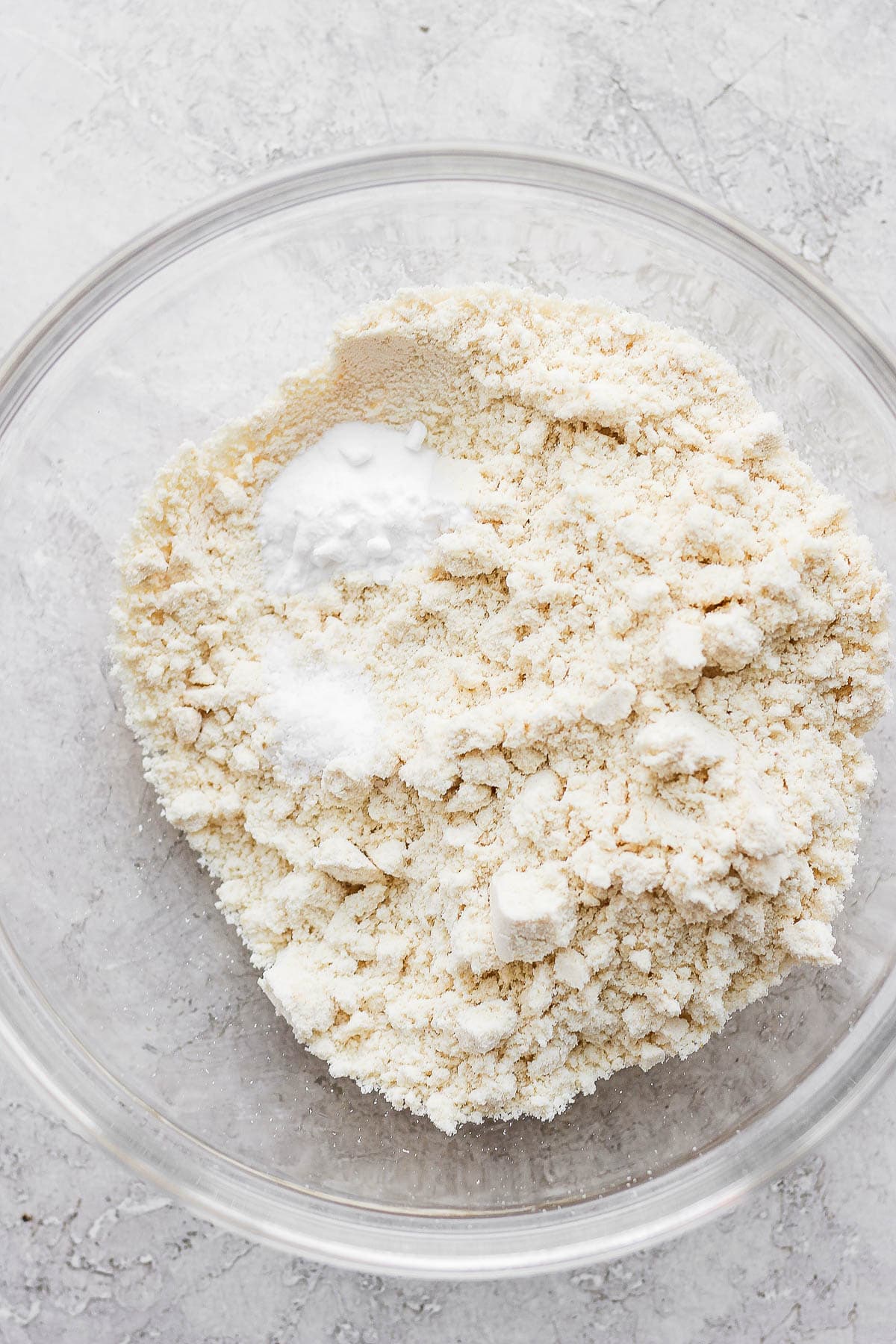 A bowl of dry ingredients for paleo banana bread.