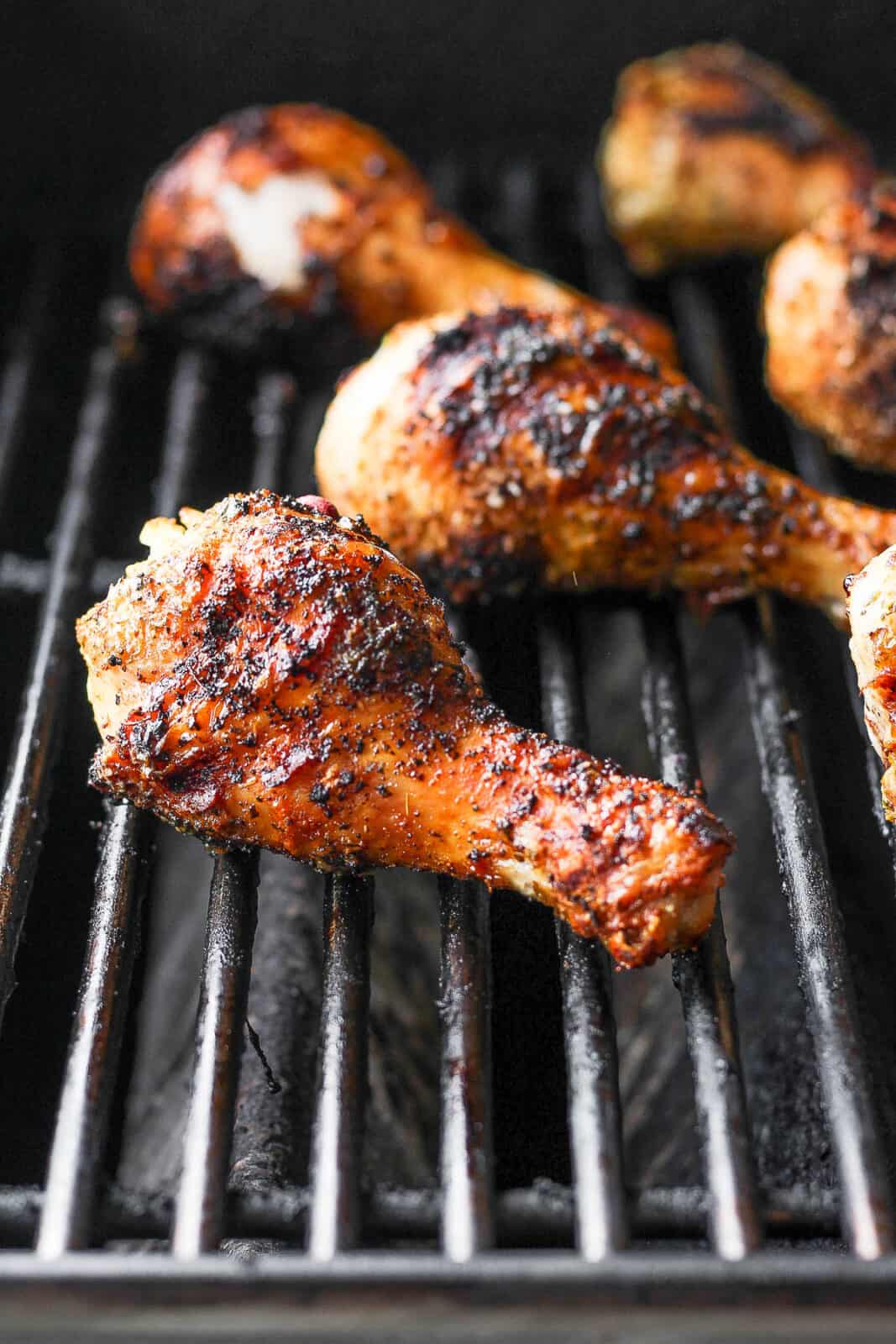 Chicken legs on a grill. 