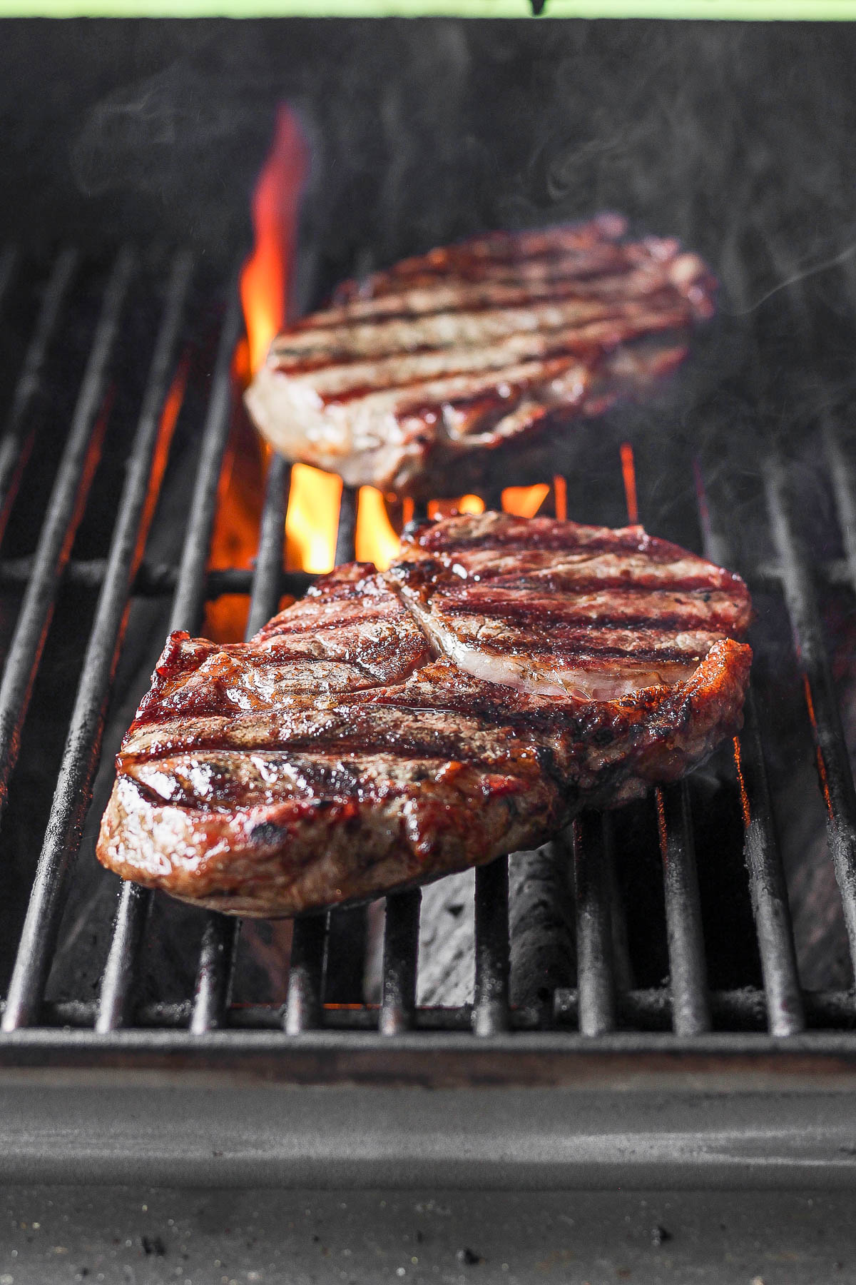 Two steaks on the grill. 