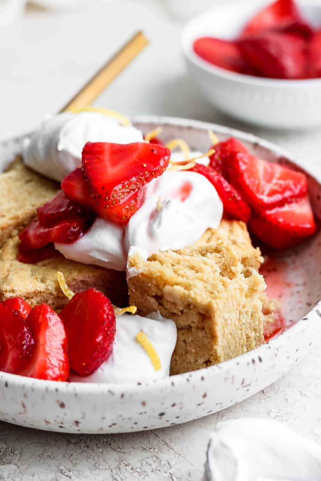 Bowl of gluten free strawberry shortcake. 