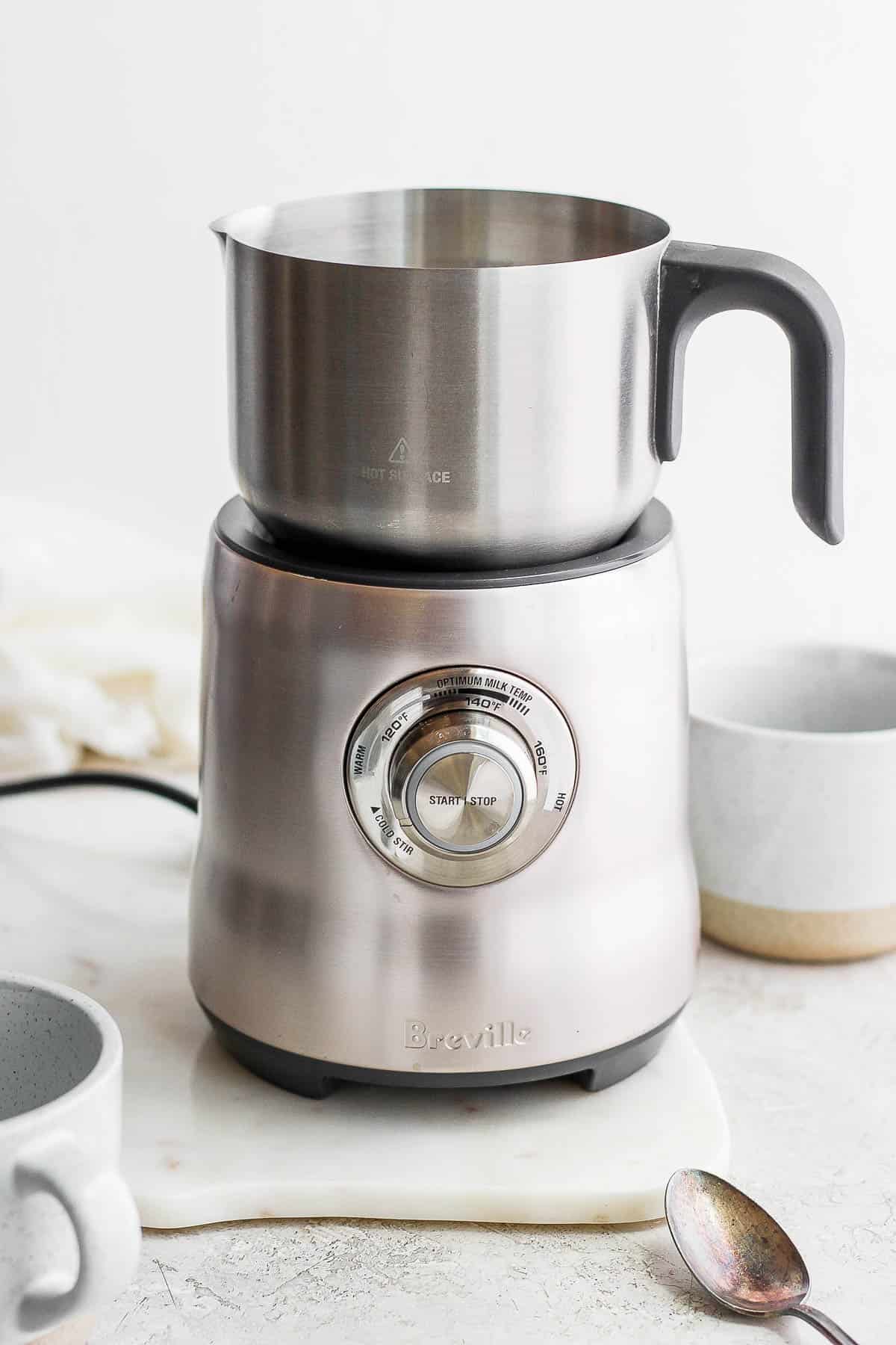 A Breville milk frother. 