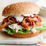 BBQ Chicken Sandwich on a marble board.