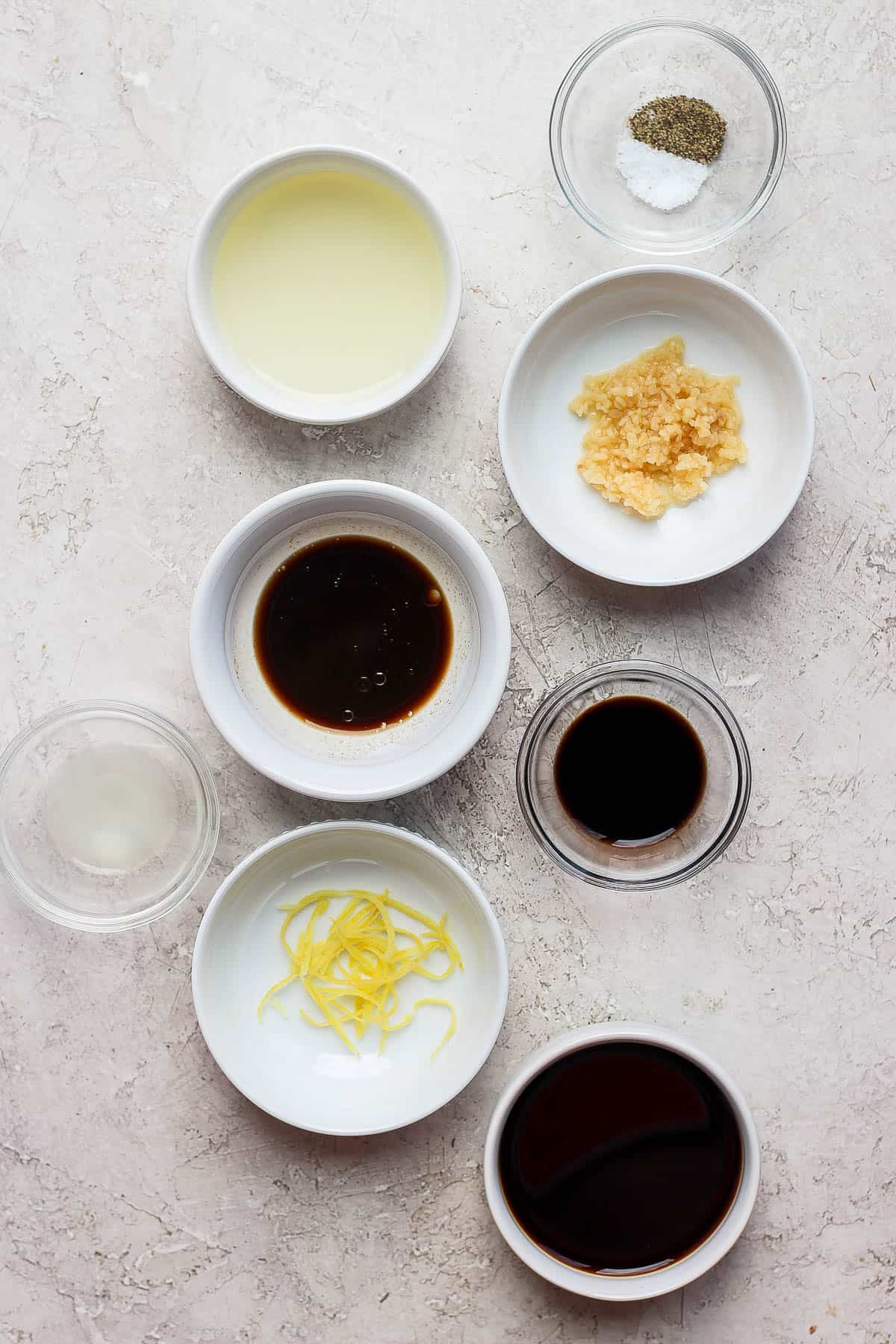 Chicken marinade ingredients in bowls.