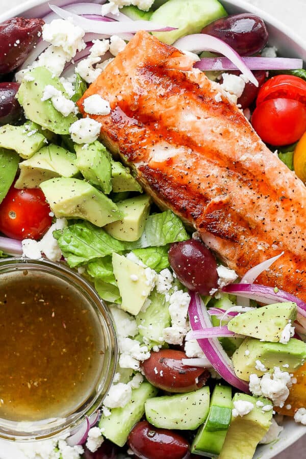 Bowl of grilled salmon salad.