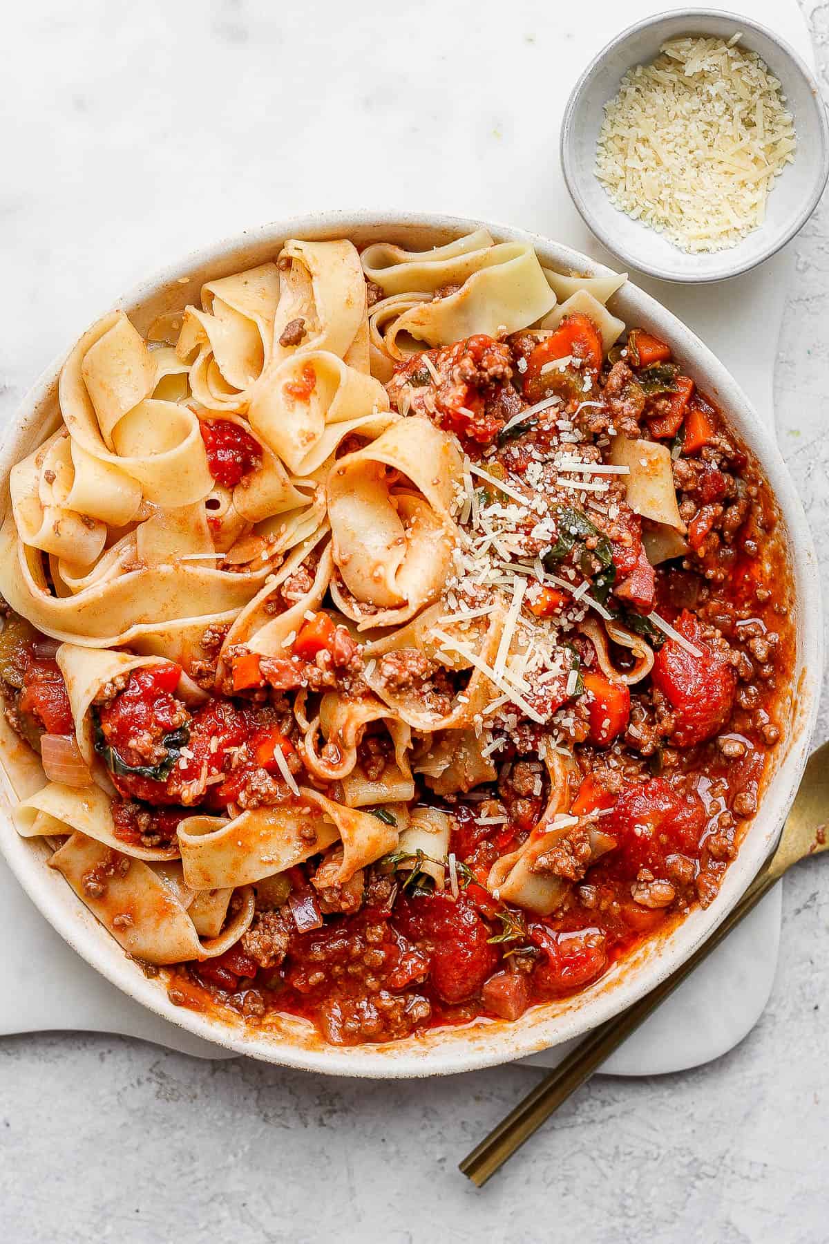 Bowl of pappardelle bolognese.