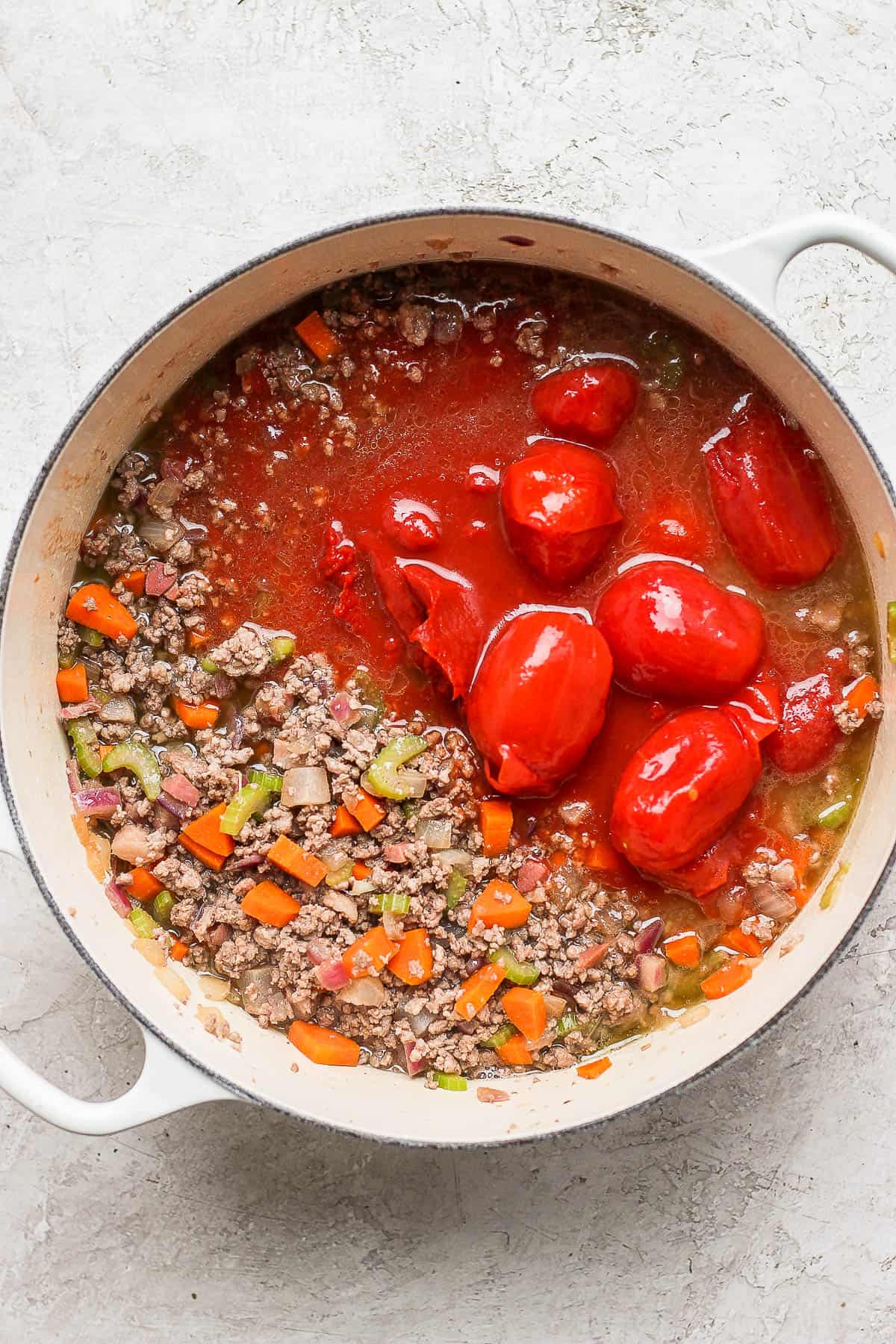 All of the tomato ingredients added to the pot.