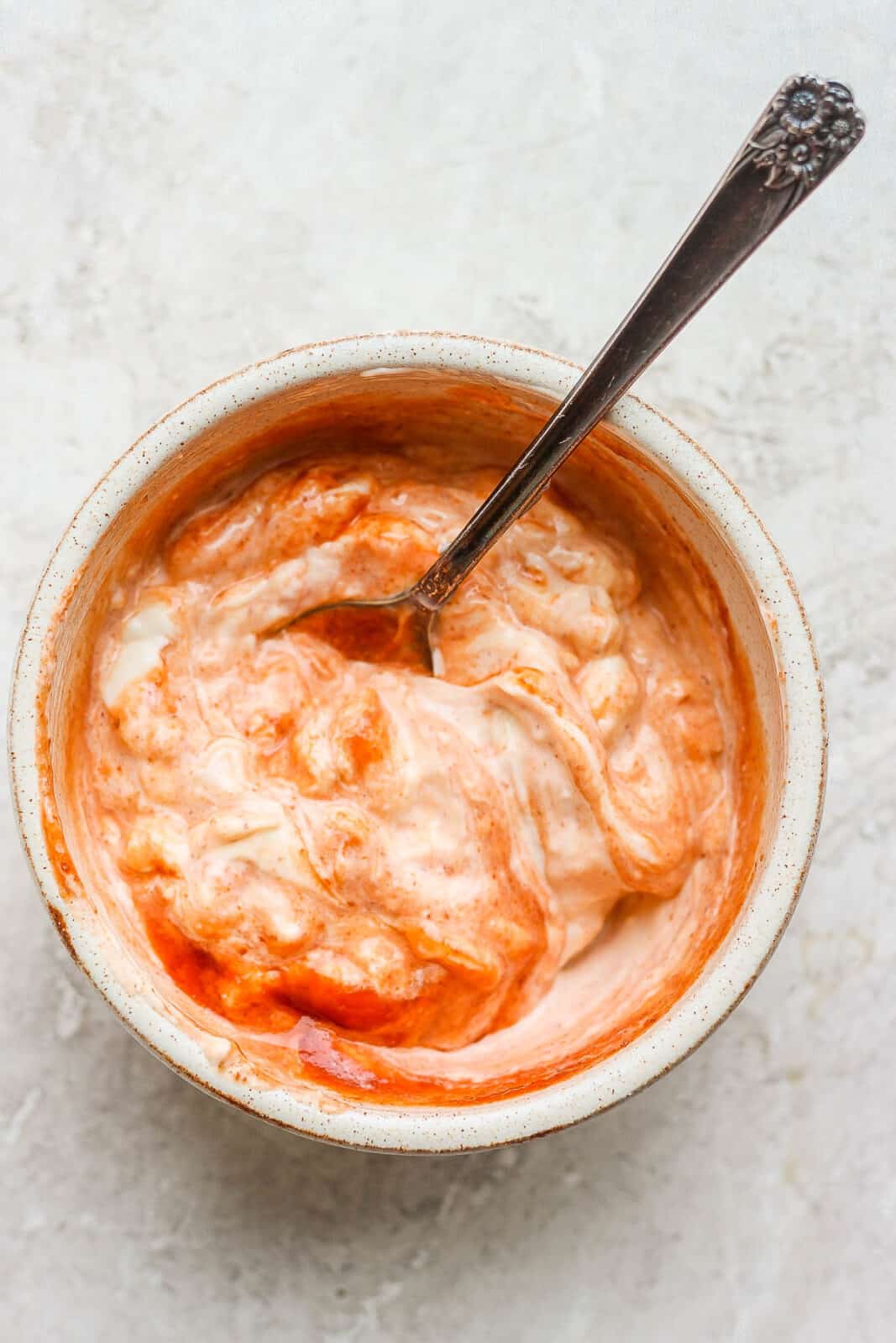 A bowl of spicy mayo.