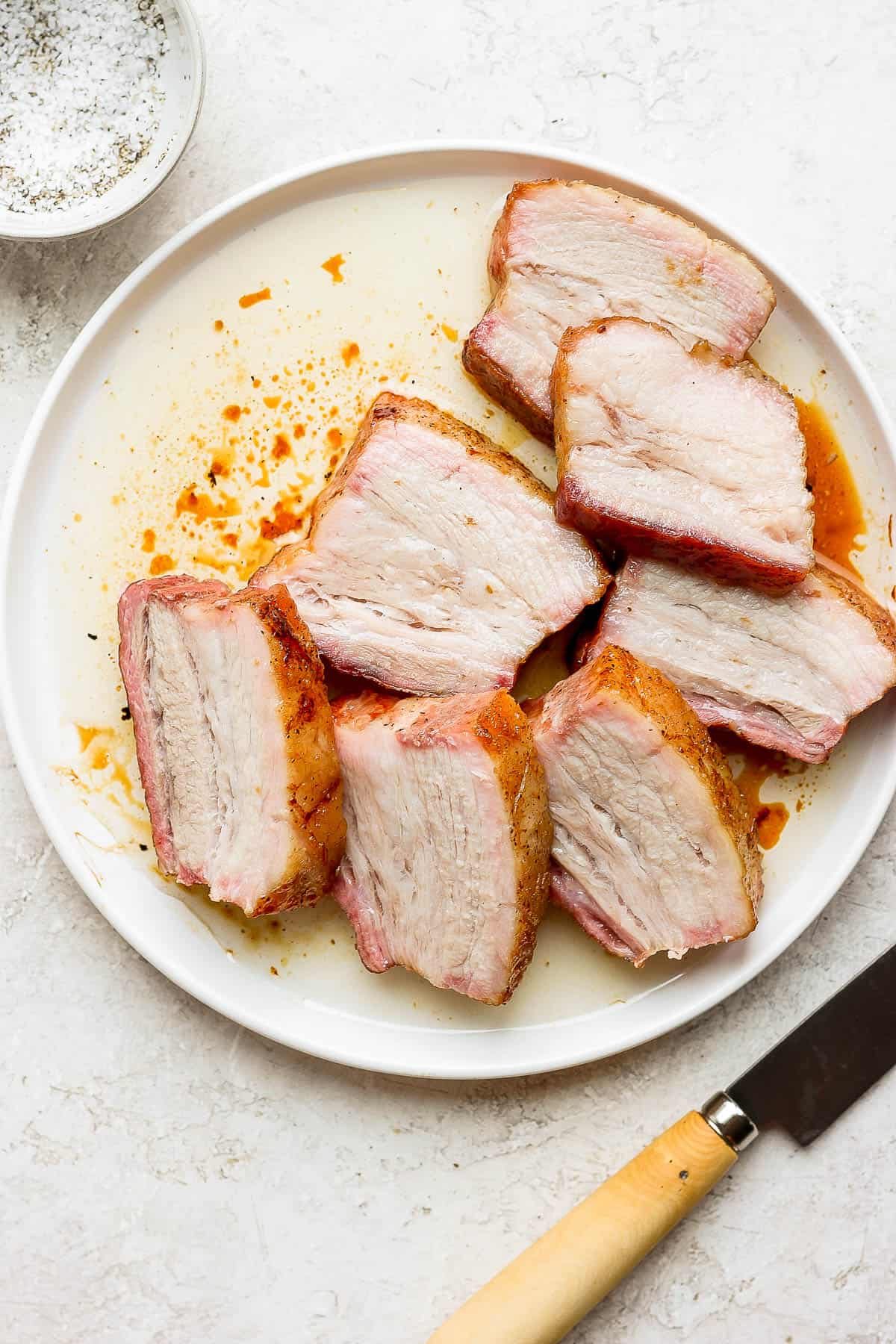 A plate of smoked pork belly.