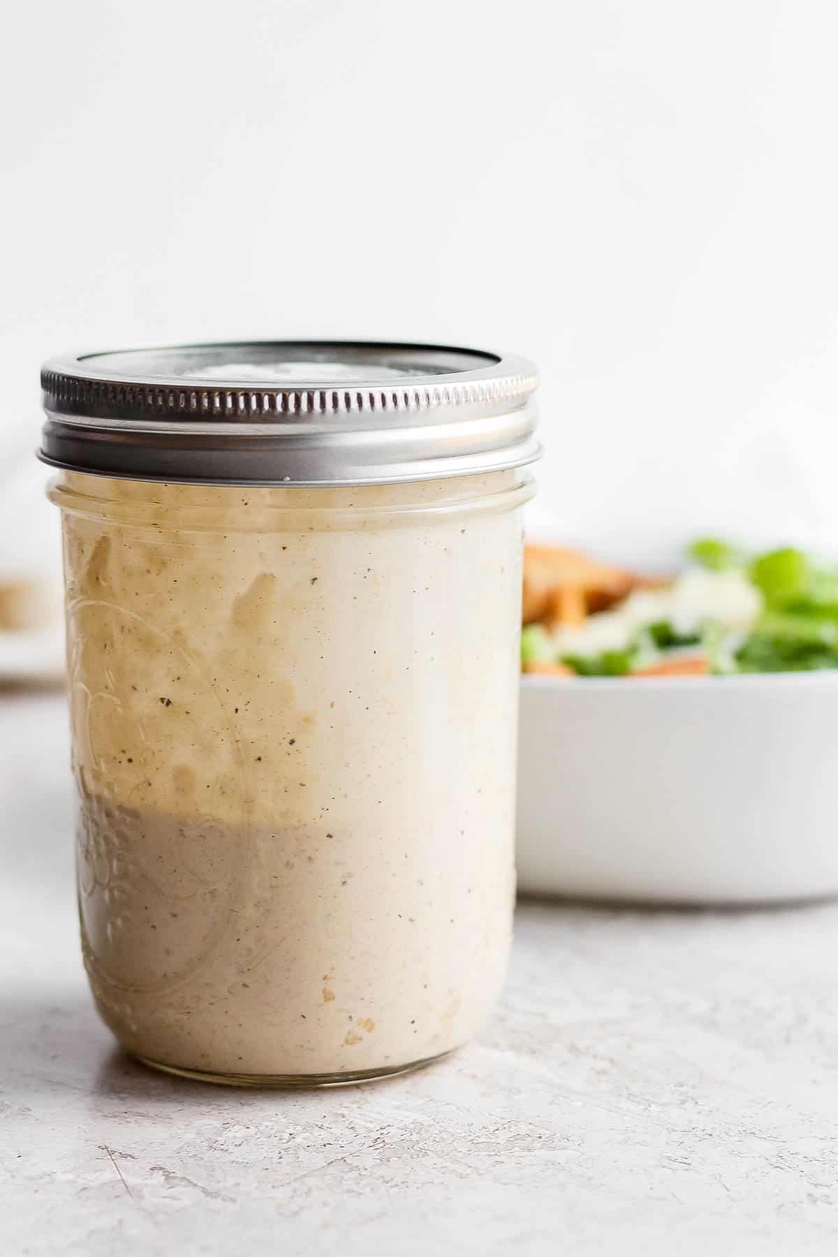 Healthy caesar dressing in a mason jar.