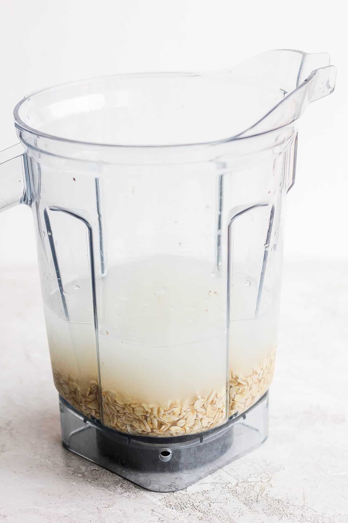 Rolled oats and cold water in a blender.