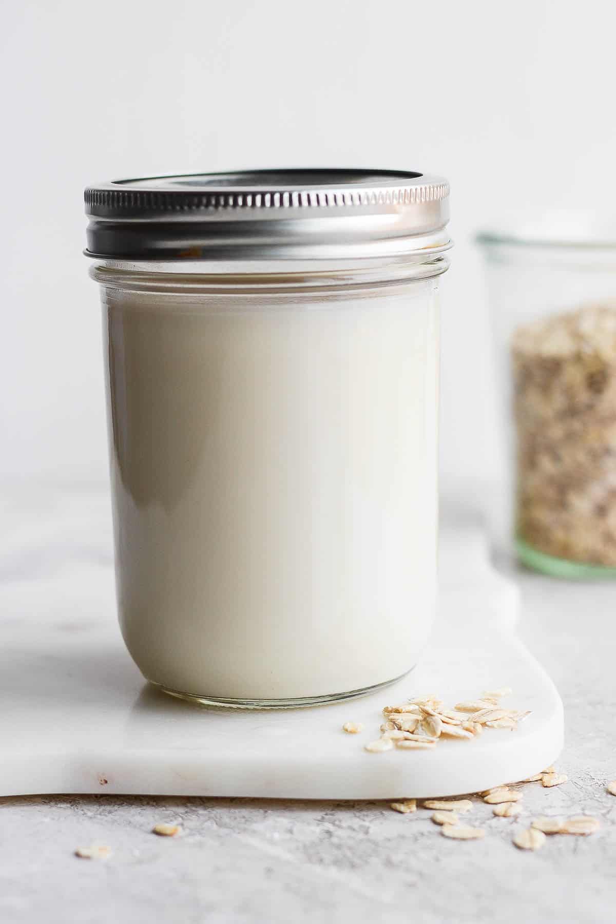 Oat milk in a mason jar.