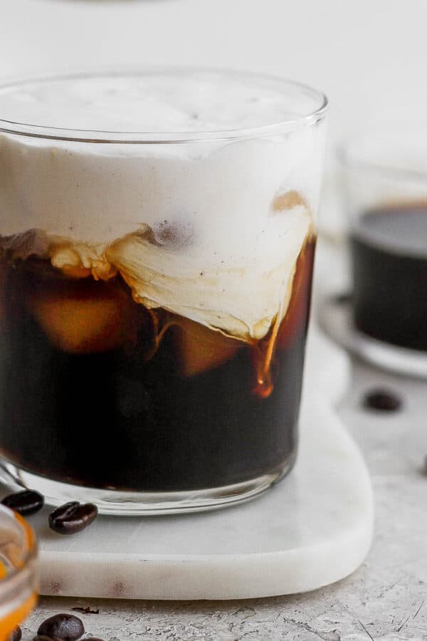 Glass of pumpkin cream cold brew latte.