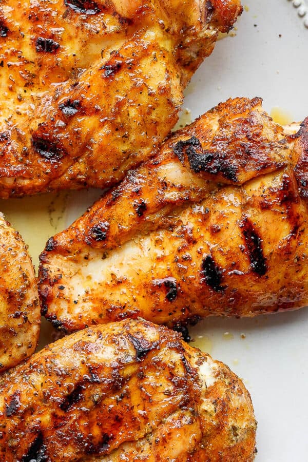 Plate of smoked chicken breasts.