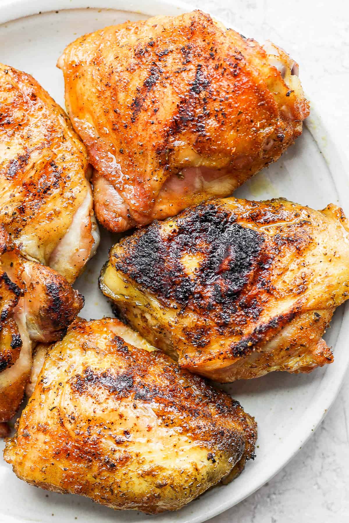 Smoked Chicken Thighs (Crispy + Juicy) - The Wooden Skillet