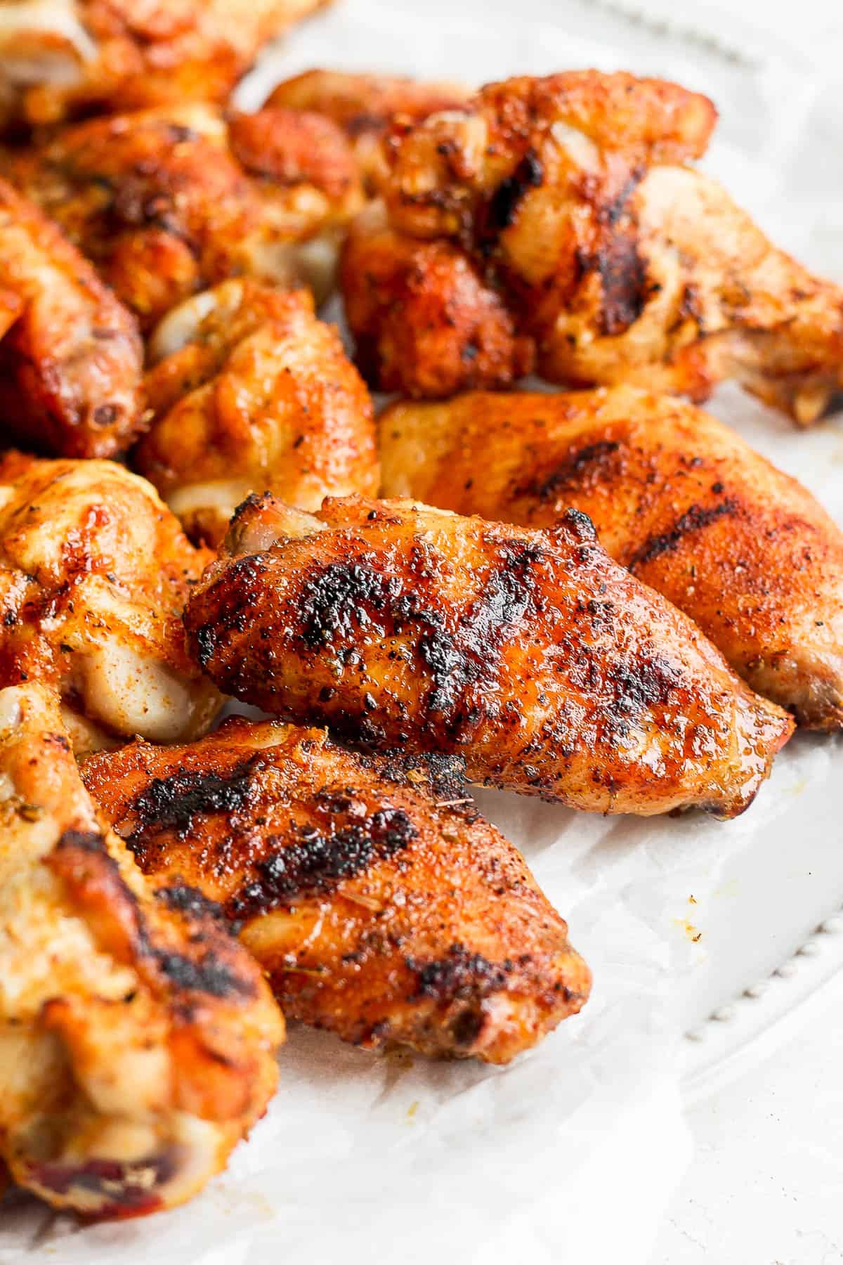 Smoked chicken wings on a plate. 