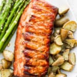 Plate of smoked pork loin, smoked potatoes and smoked asparagus.