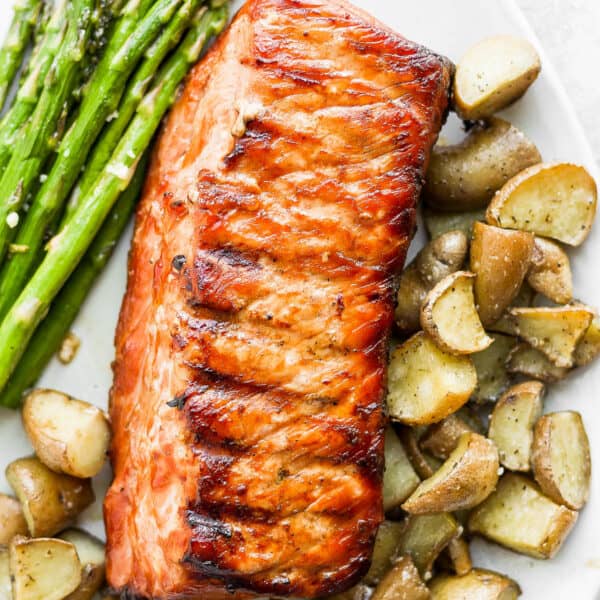 Plate of smoked pork loin, smoked potatoes and smoked asparagus.