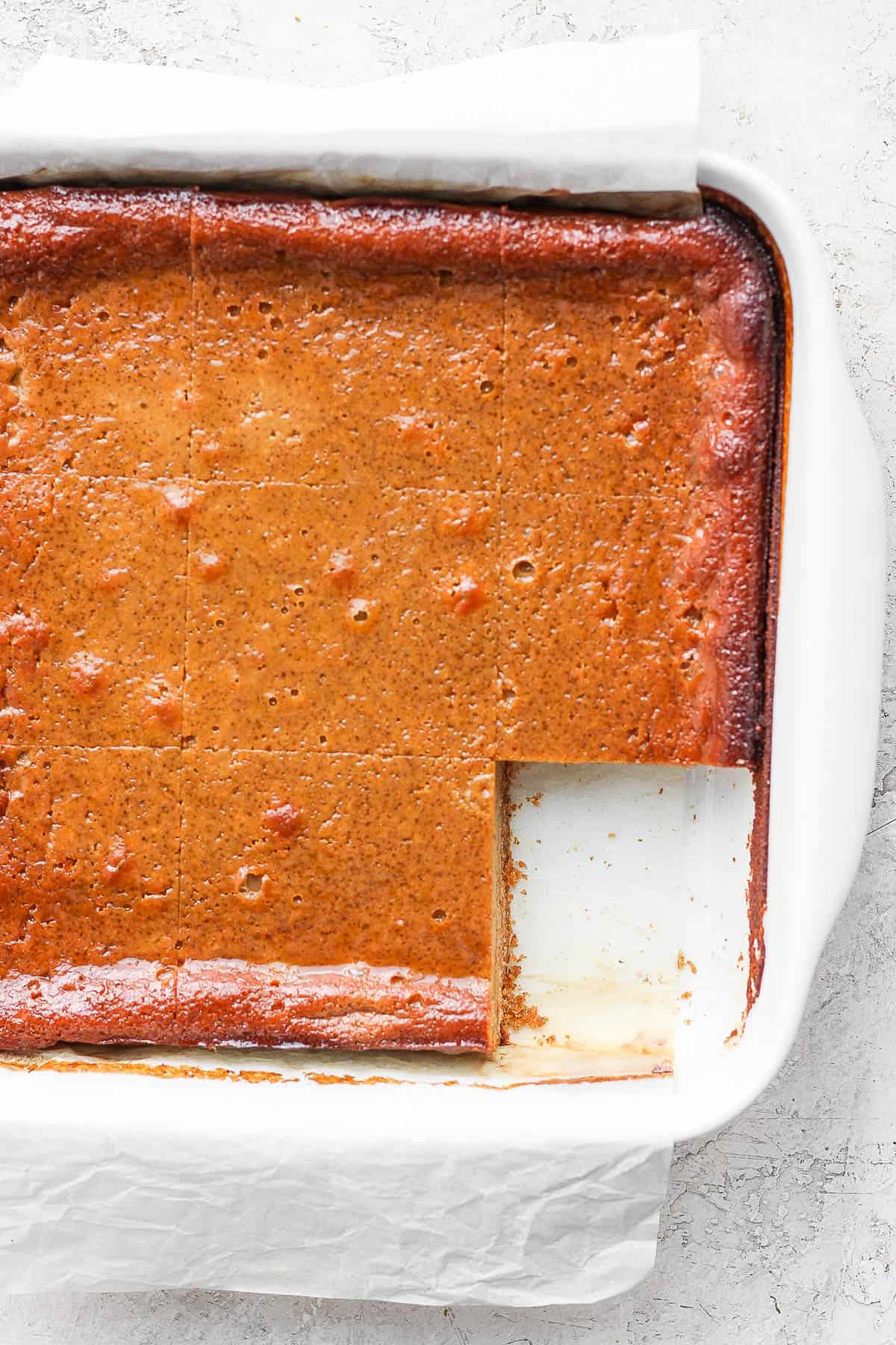 Pumpkin pie bars with one taken out of the pan.