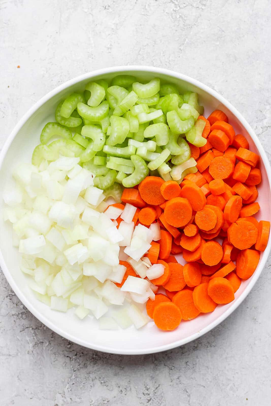 Cut up onion, celery, and carrots.