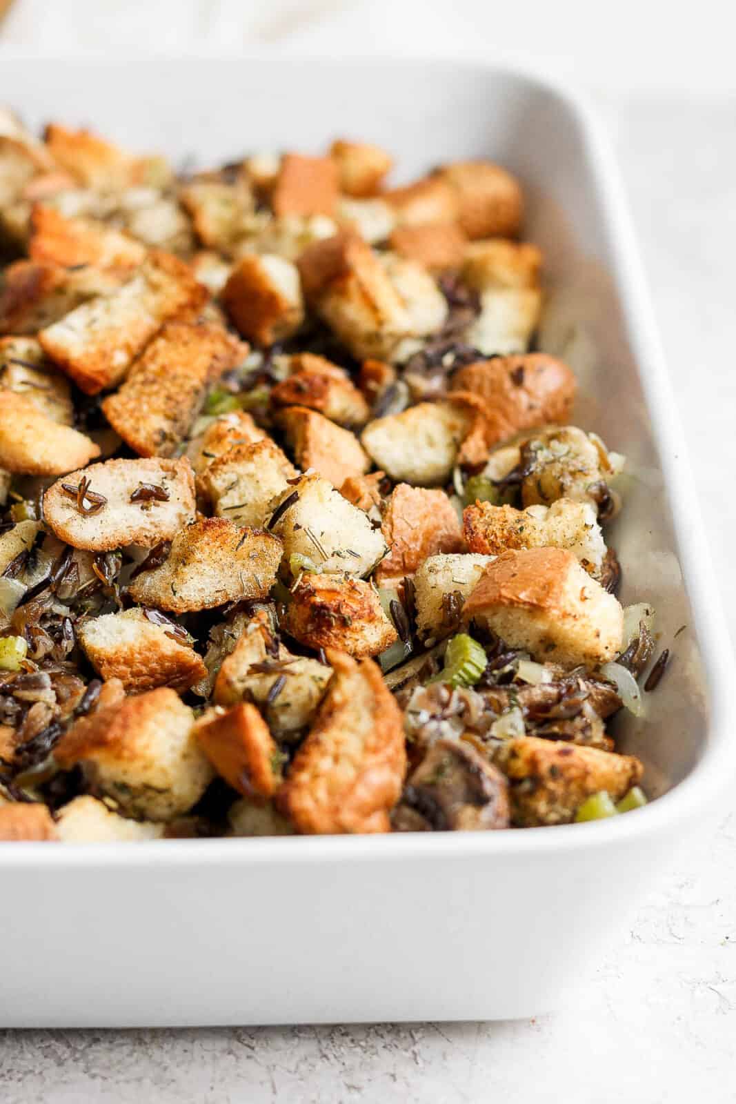Wild rice stuffing in a baking dish.