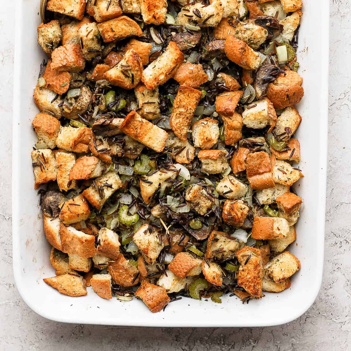 Wild rice stuffing in a baking dish.