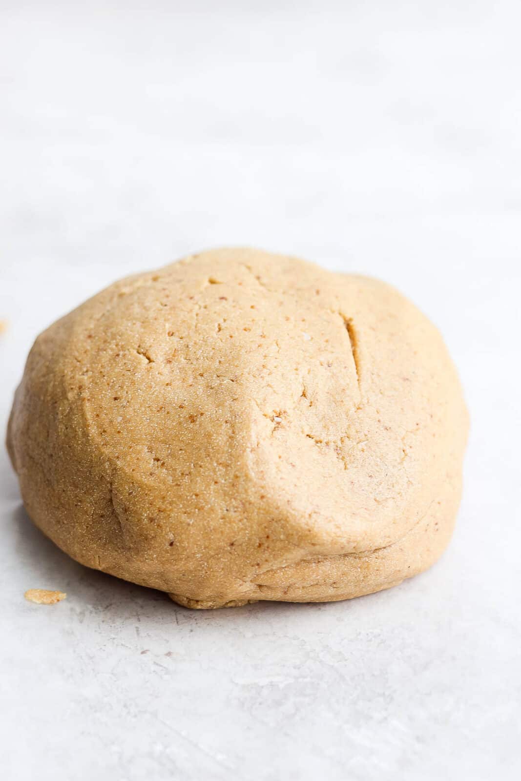Almond flour sugar cookie dough in a ball.